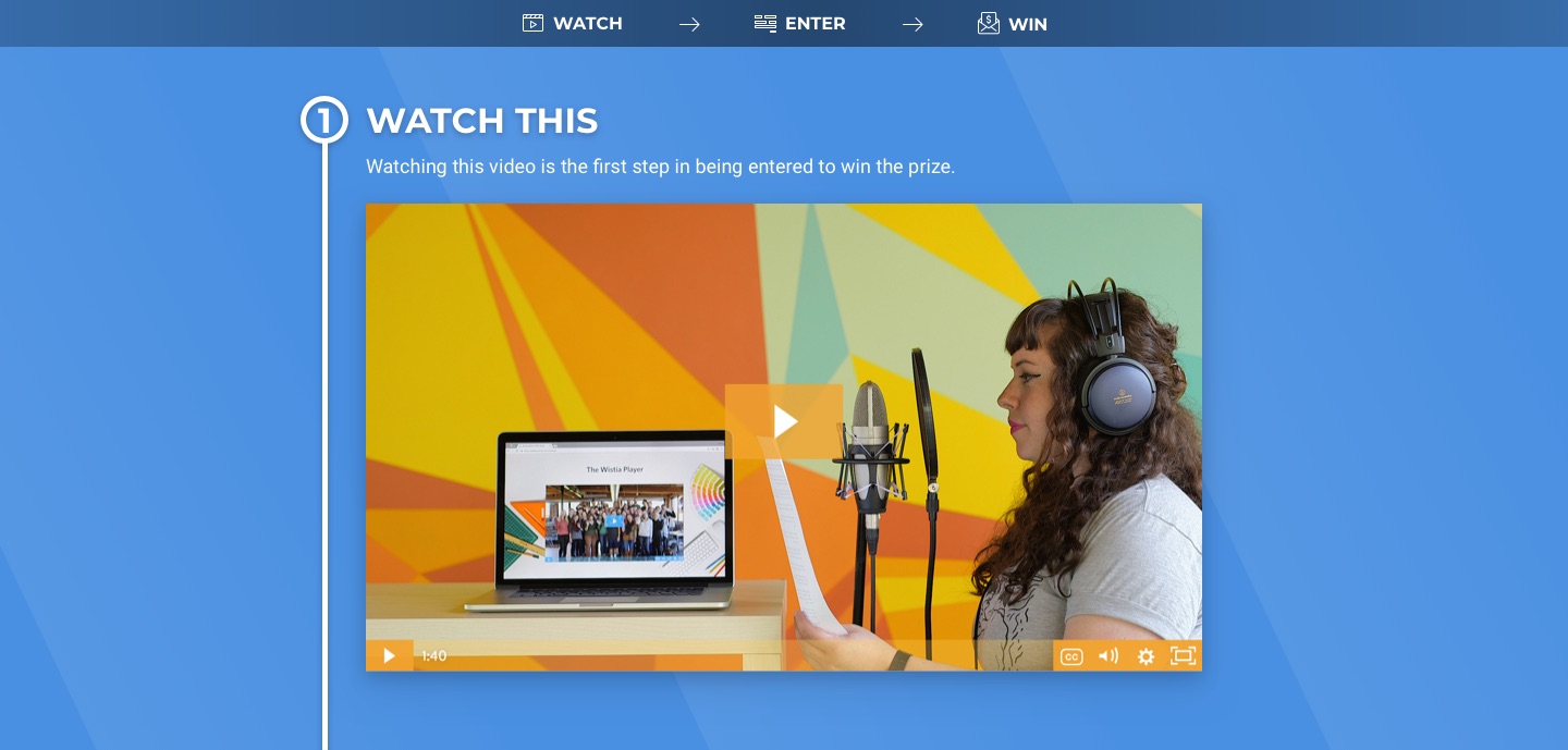 A generated campaign landing page with a Watch, Enter, Win step bar across the top, and step one — "Watch this: watching this video is the first step in being entered to win the prize" — above an embedded video player